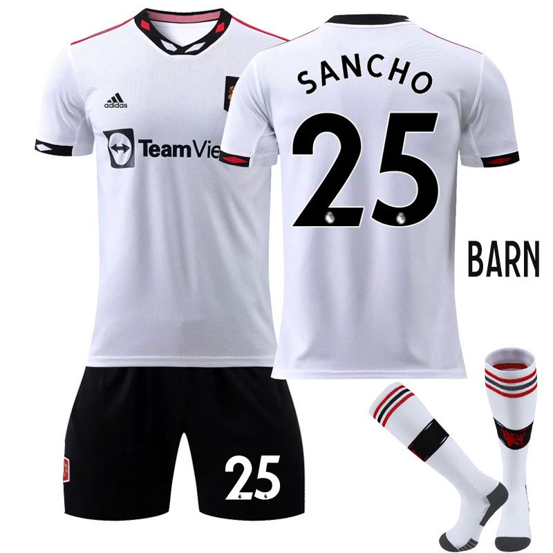 Barn Manchester United Bortedrakt 2022-23 Hvit Kortermet + Sort Korte bukser Sancho 25