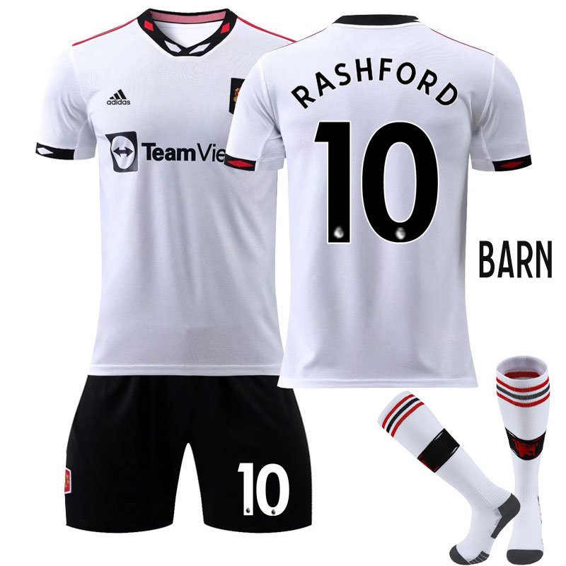 Rashford 10 Manchester United Bortedrakt 2022-23 Hvit Kortermet + Sort Korte bukser Barn