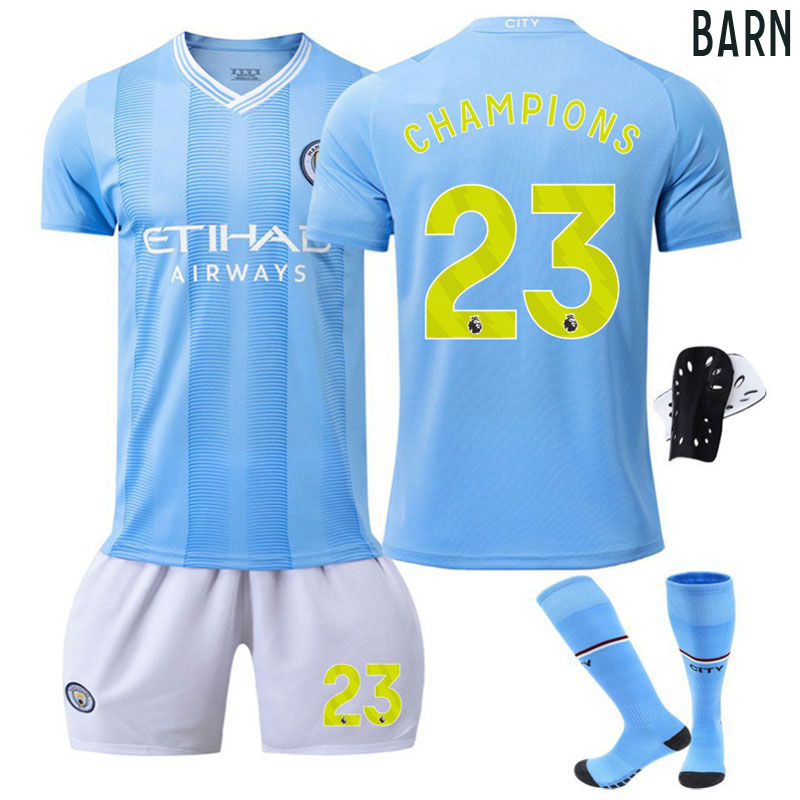 Billige Fotballdrakter Barn Manchester City 2023-2024 Hjemmedrakt Med CHAMPIONS 23 trykk