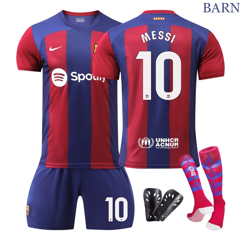 Barn drakten FC Barcelona Hjemmetrøye 23/24 Kortermet + Korte bukser Messi 10