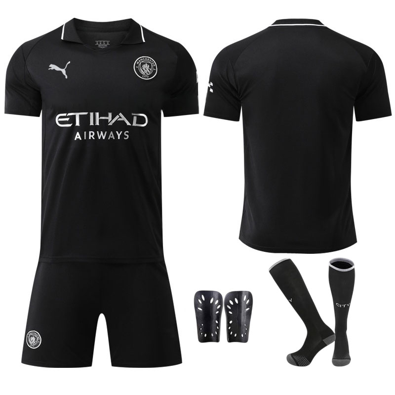 Manchester City bortedrakt barn 2025/26 - svart drakt med shorts